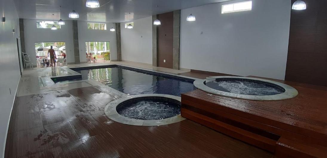 Flat Cavalinho Branco - Vista Do Lago E Piscina Aquecida อากวัสจิลิงดอยา ภายนอก รูปภาพ